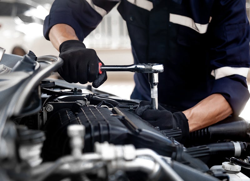 Mechanic working on a vehicle